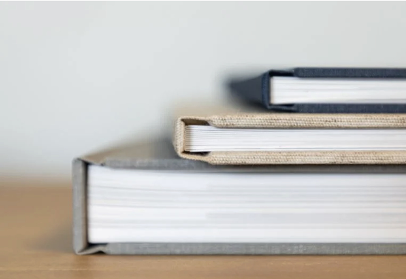 Stacked lay-flat wedding albums
