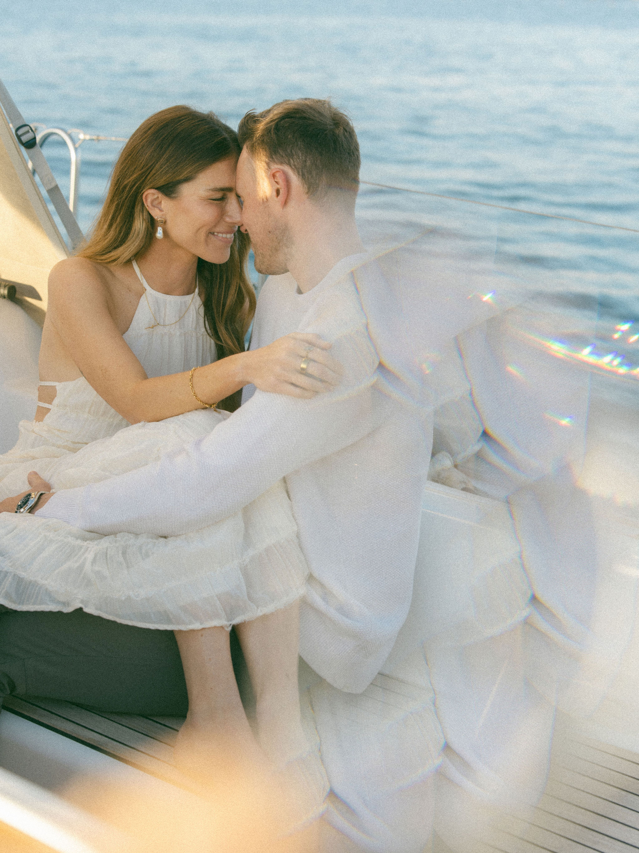 Couple on boat at golden hour