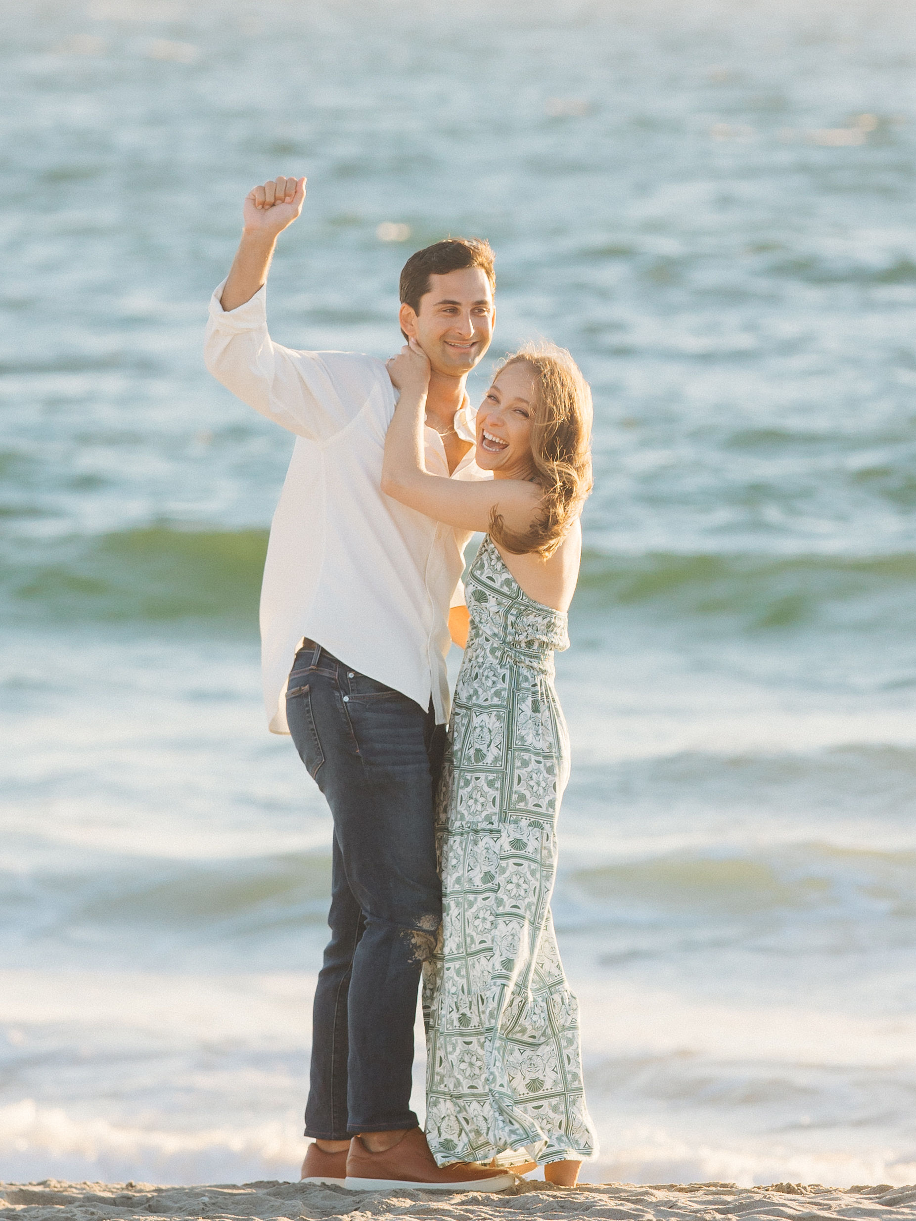 Engaged couple beach portraits