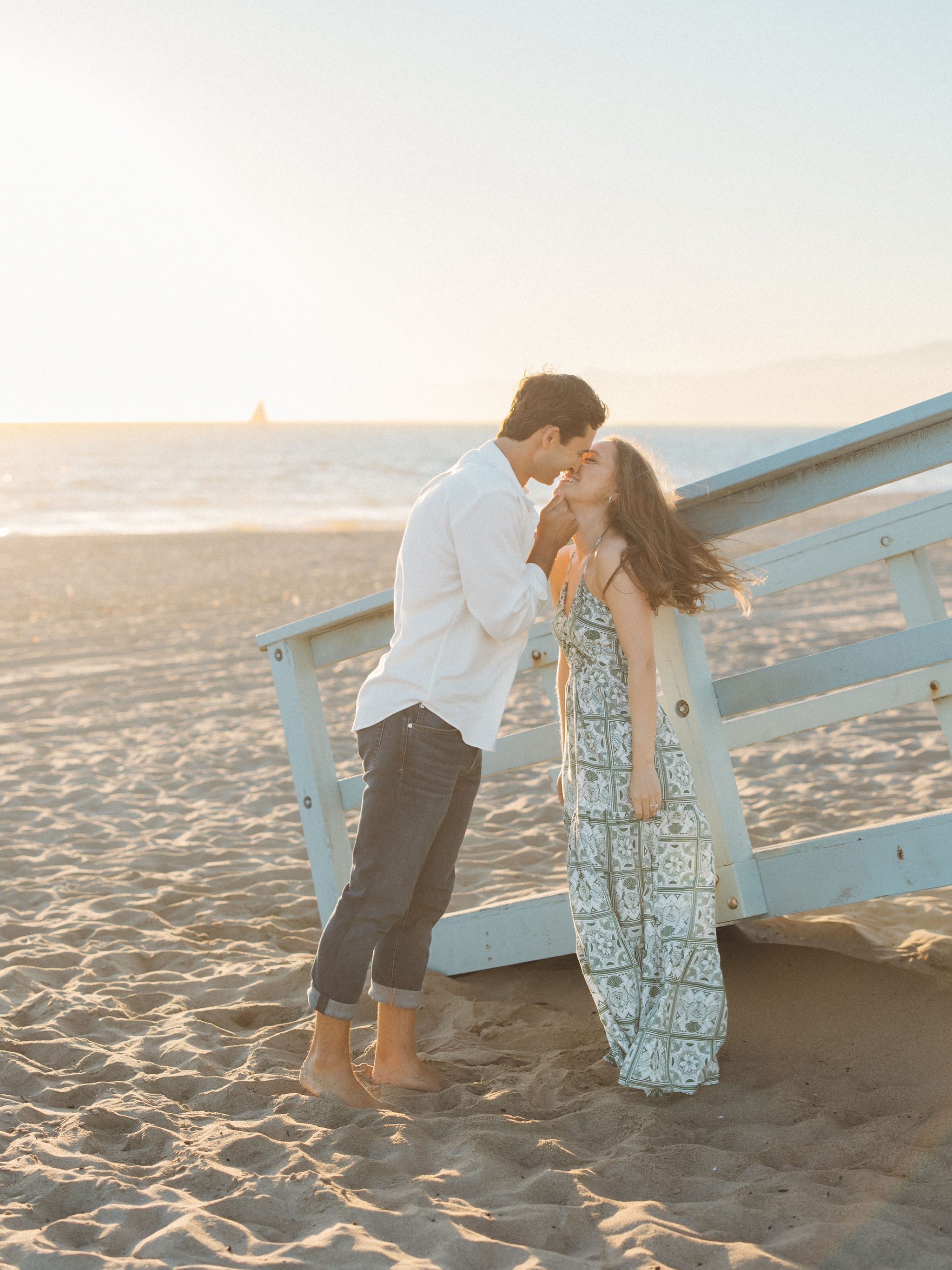 Engaged couple at golden hour