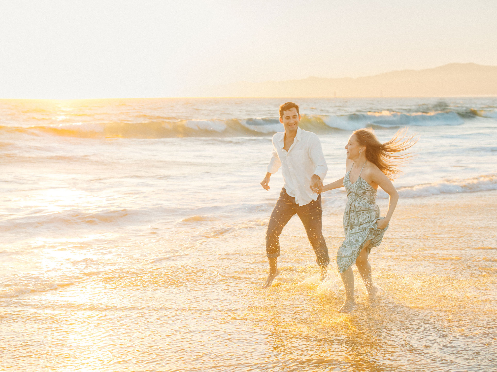 Couple embracing at sunset